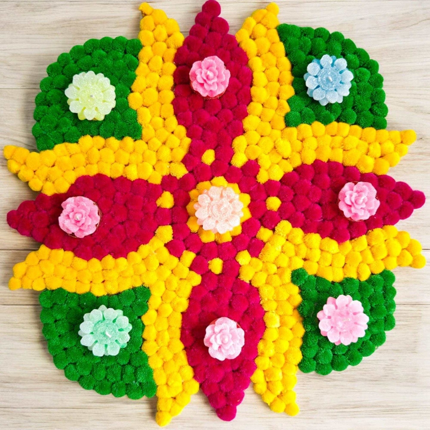 Flower Design Pom Pom Rangoli with Candles